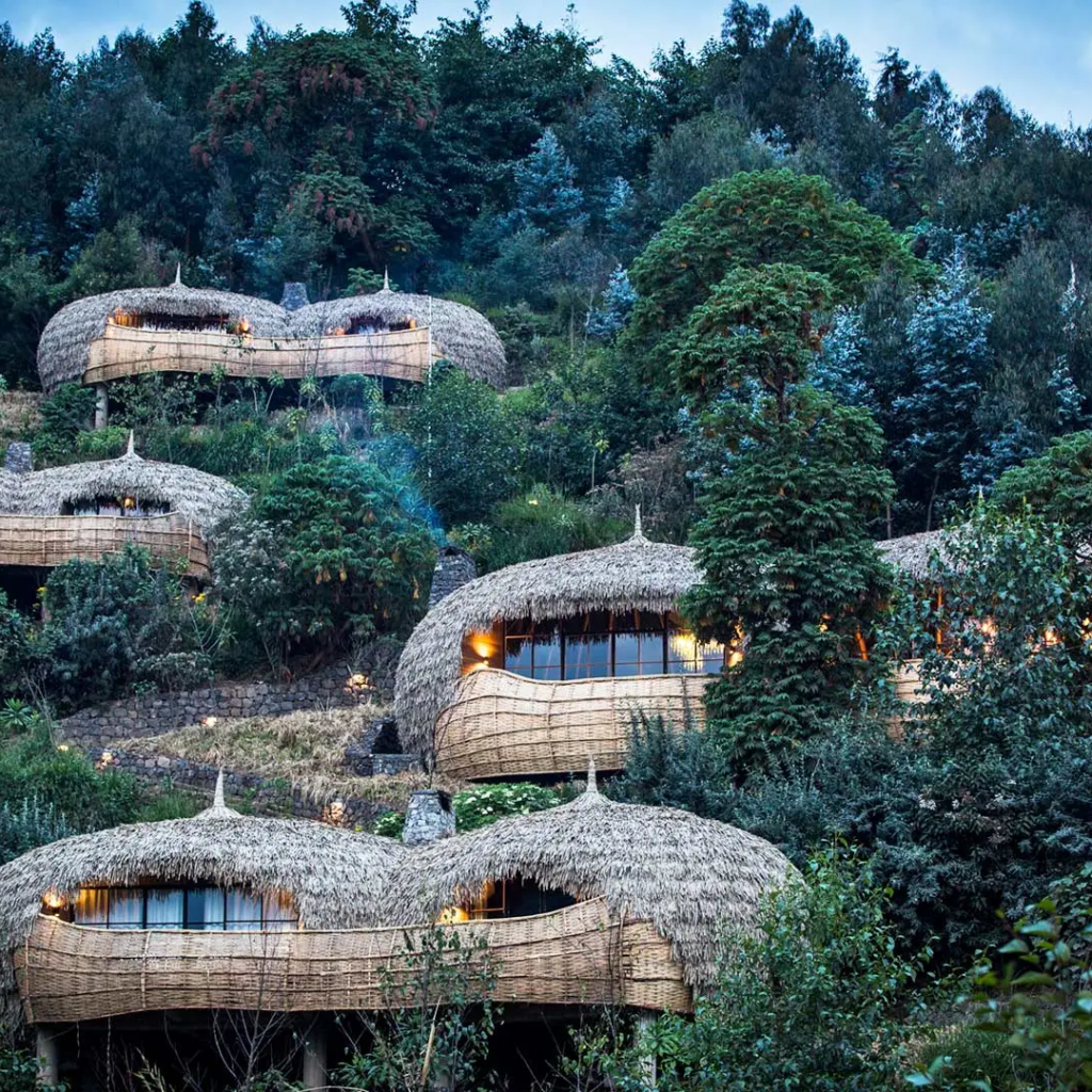 Domed villas of a luxury lodge in a forest near Volcanoes National Park